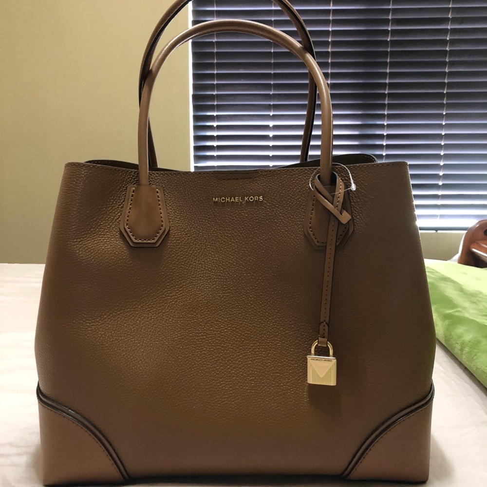 Michael Kors light brown tote.